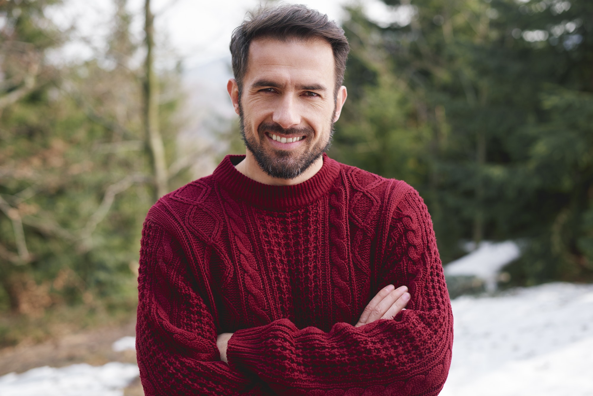 Portrait of smiling man in the forest